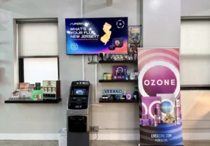 Vending machine and promotional display for cannabis products in a retail environment